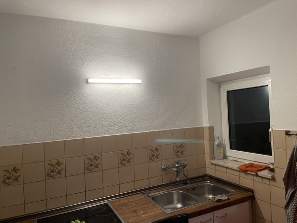 ugly kitchen wall with an actual, functioning light